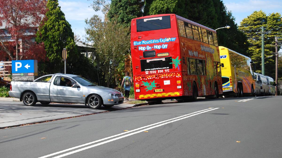 Leura lottery: Buses often block the view of drivers trying to get out of the Woolworths carpark.