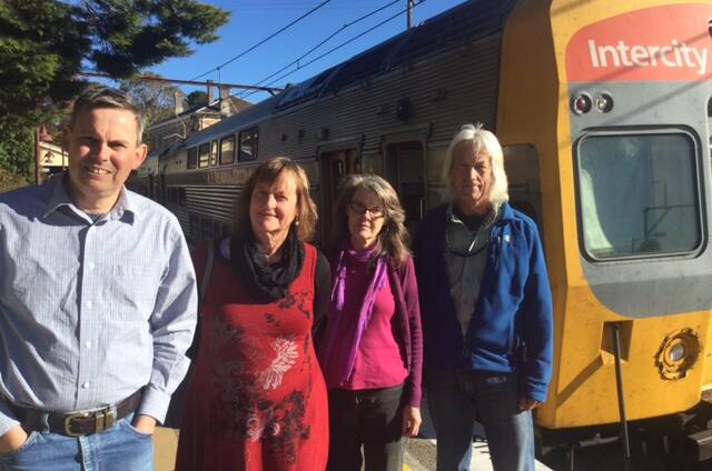 Michael Paag, transport advocated and convenor of the Blackheath Highway Action Group with commuters Heather Pye, Kathy Butler, and Gary Butler.