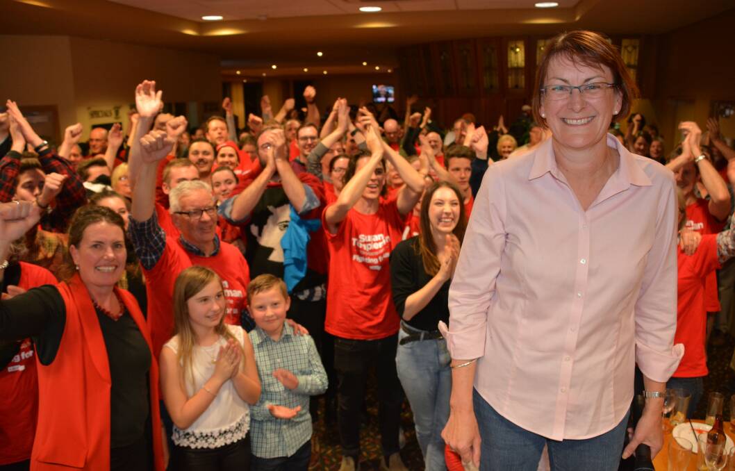 Victory: Susan Templeman and her delirious supporters on Saturday night at the Royal Hotel in Springwood.