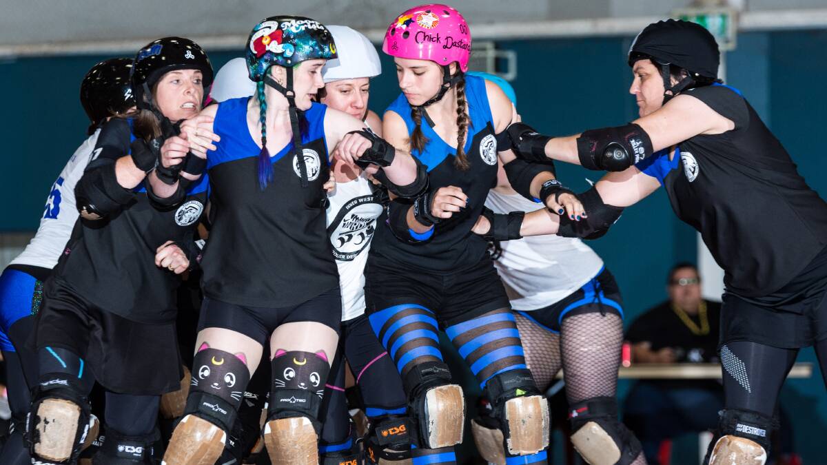 In action: Free Sisters vs Inner West Roller Derby League. Photo: Richard Rayment.