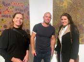 Kate Reid, Aaron White and Ashlee Bucholtz at the Three Echoes - Western Desert Art opening at the Blue Mountains Cultural Centre. Picture supplied