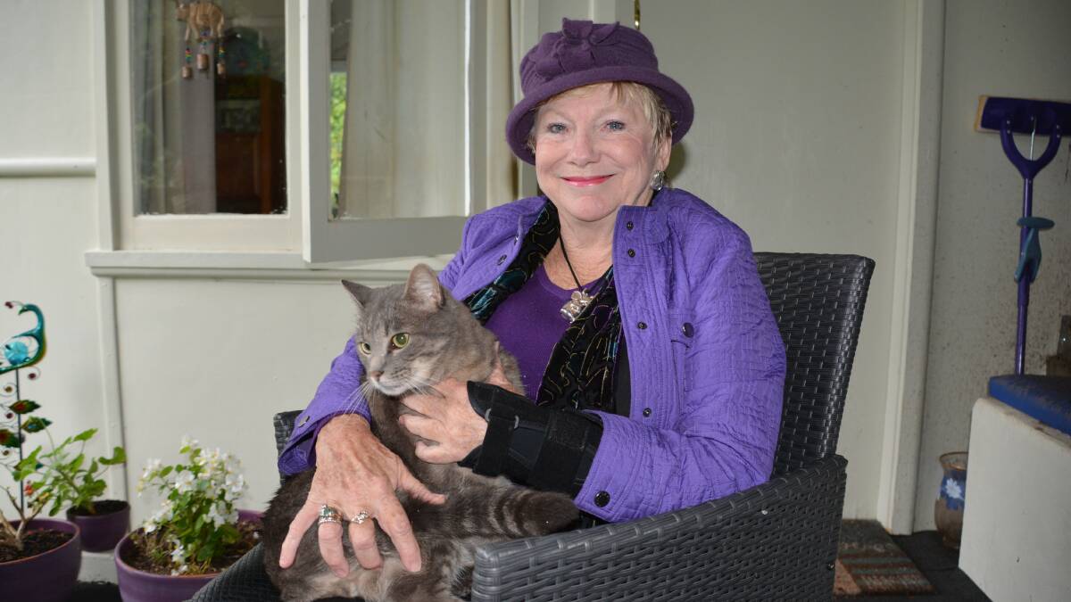 Not homeless any more: Katoomba's Margaret Gargan, with her cat Raffy, has first-hand experience of being without a home. She is running the Rotary ball next month at The Carrington to raise funds for the issue.