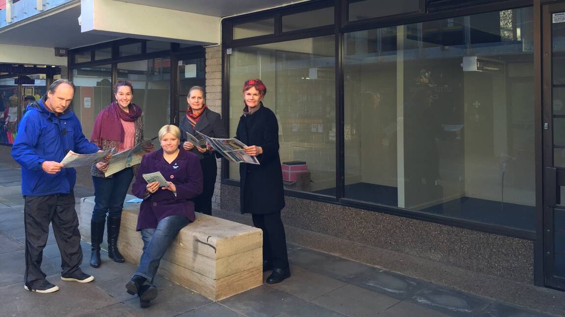 Being ‘lost tourists’ outside empty shops in Civic Place, from left Warren Ross, Anna Dohnt, and Greens candidates for Ward 1 Nichole Hoskin, Carole Stanford and Kerry Brown.