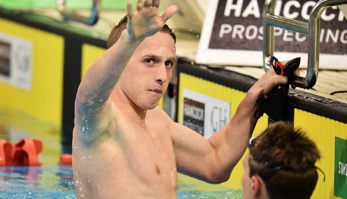 National champion: Matt Wilson celebrates winning the men's 200 metre breaststroke at Australian Swimming Championships in Adelaide on Monday. Photo: Quinn Rooney/Getty Images.