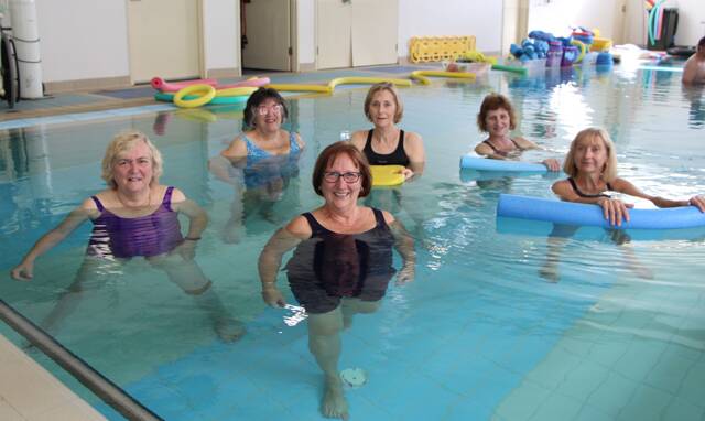 Head of Physiotherapy, Penny Lees (centre), with regular users of the Blue Mountains Hospital Hospital hydrotherapy pool.