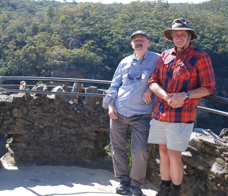 Iconic feature: Jim Smith and fellow bushwalker Ron Newman in front of the historic wall built at Princes Lookout.