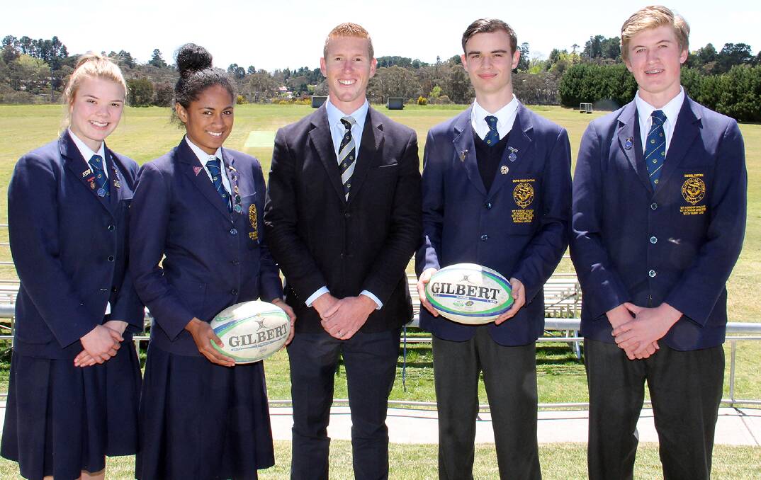 Rugby fever: From left, Fleur Young, Selai Rokotuiwai, teacher Nic Webb, Julian Aldridge, and Callum Simpson are excited about the Blue Mountains and Greater West Rugby Sevens Carnival in 2017.
 
