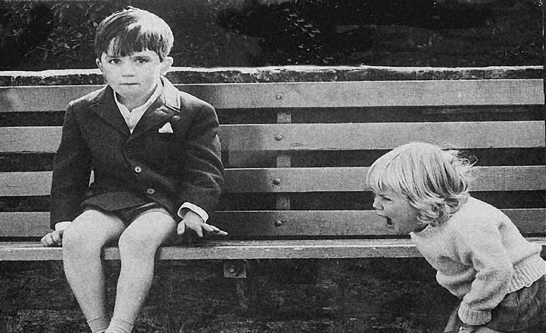 It wasn't me: A classic moment of sibling relations in the 1960s captured by Wentworth Falls photographer Barry Lesberg. 