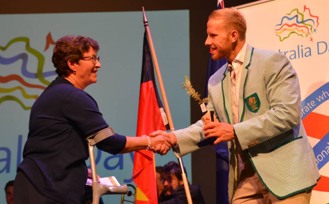 Top honour: Blue Mountains Citizen of the Year Helen Walker receives her award from Blue Mountains Australia Day Ambassador, Olympian Cameron Girdlestone.