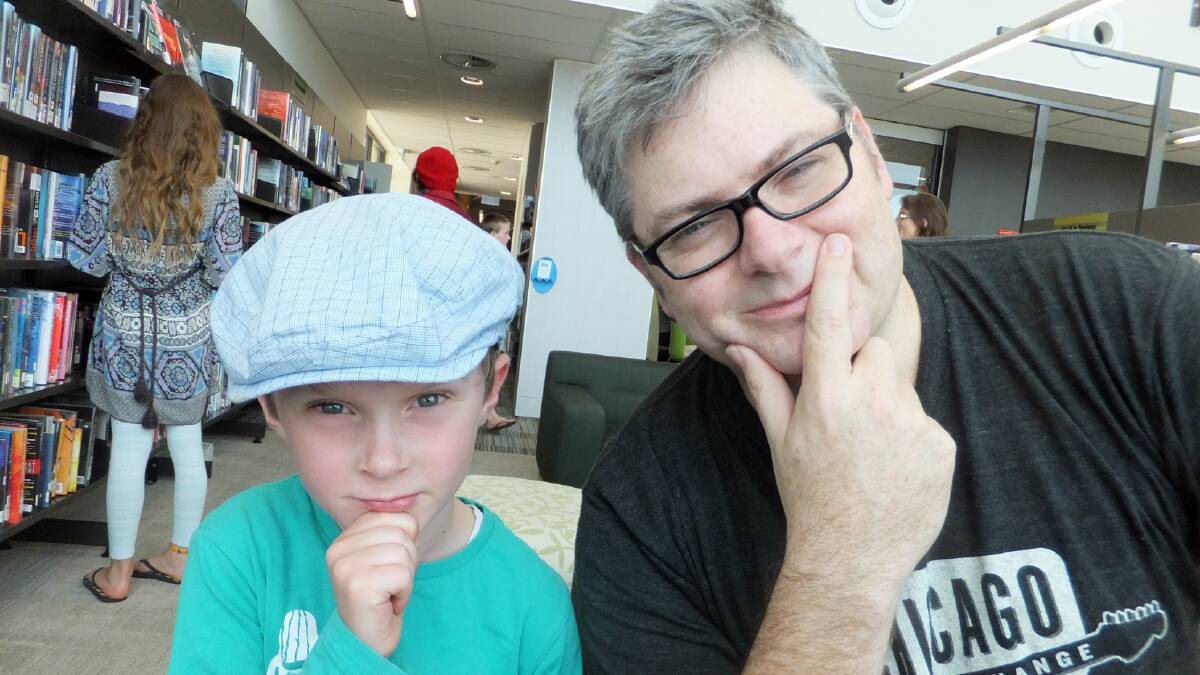 William Candor and children's author James Roy contemplate the art of writing last Saturday.