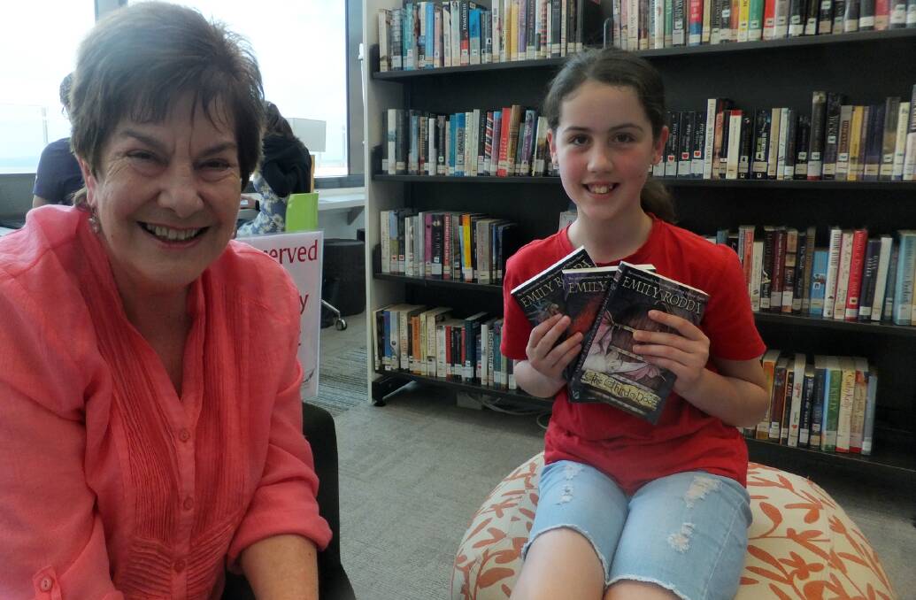 Happy to meet: Renowned children's author Emily Rodda with fan Alicia Thompson at Katoomba Library.