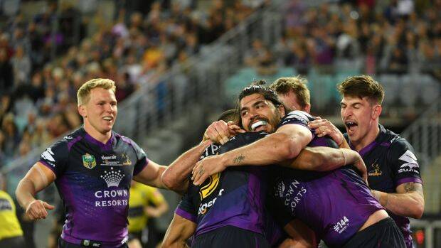 Storm's Antonio Winterstein is congratulated after his try. Photo: AAP