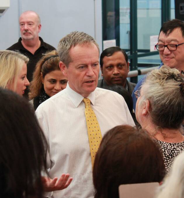 MEETING AND GREETING: Mr Shorten speaks to members of the audience following the meeting. Local emotions ran high around Badgerys Creek airport.