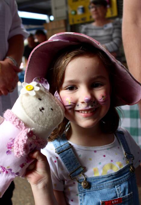 Look what I found mum: Jemma Griffiths picks up a hand made toy at last year's event.