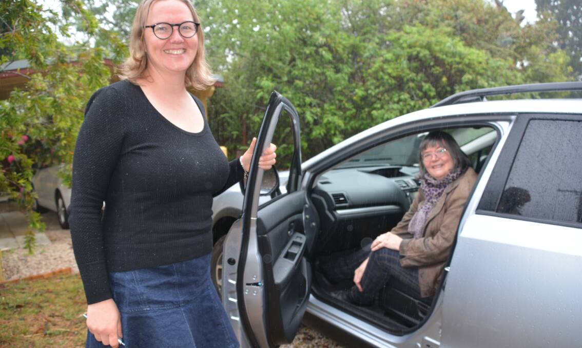 Have car will travel: The first Shebah driver in the Mountains Eva Trcka with passenger, Dr Carolyn Van Langenberg,