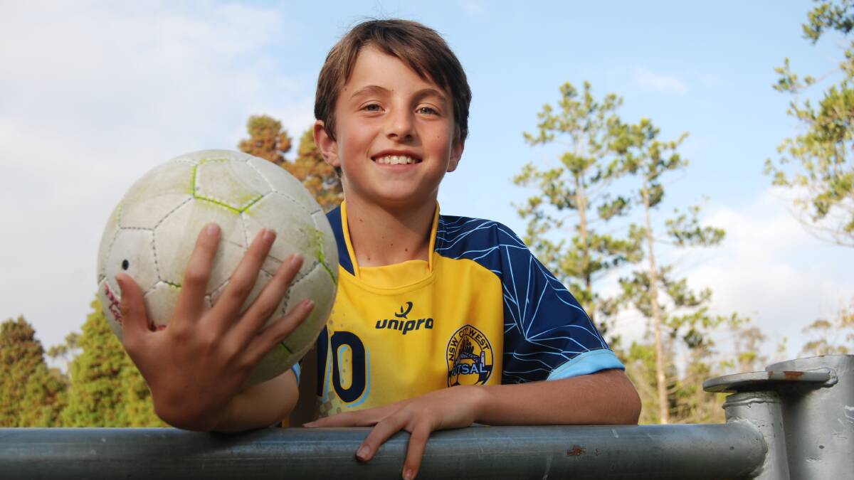 Representing his country: Toby Dance, 10 of Hazelbrook will represent Australia in soccer in Spain and America this year.