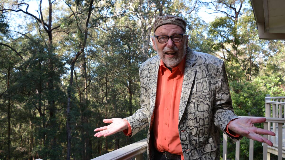 Rock brain Glenn A Baker has been honored in the Queen's Birthday list. The Winmalee rock and roll historian is pictured here in his snakeskin jacket from Katoomba on his back deck and also the moments he captured with music legends. 