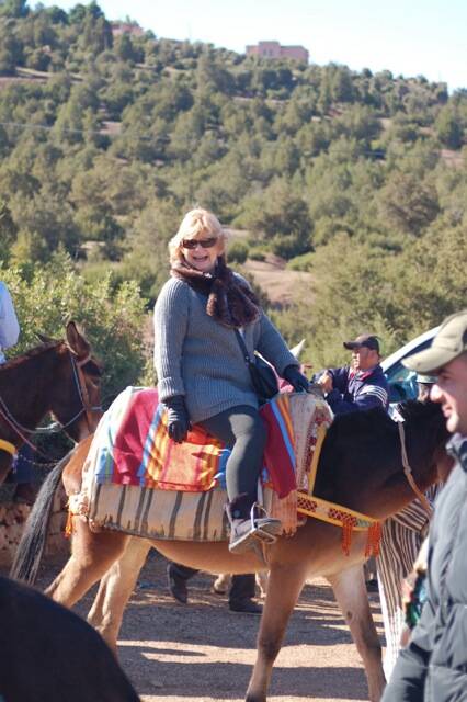 Visiting souks, exploring markets or even mule riding in Ouirgane: Carol Prior on her way to visiting a small Berber village at the foothills of the High Atlas Mountains on a mule.