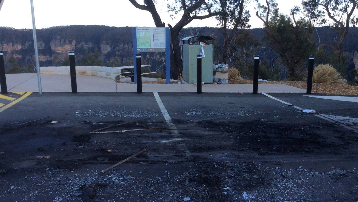 Damage: Residents suspect a car was burnt out at the spot recently.