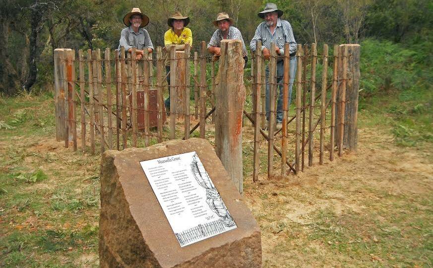 Pioneer's resting place: Max Hill, Chris Banffy of NPWS with Luke Carlon and Jack Tolhurst (both from the neighbouring Megalong Valley) at the restored gravesite of William Maxwell.