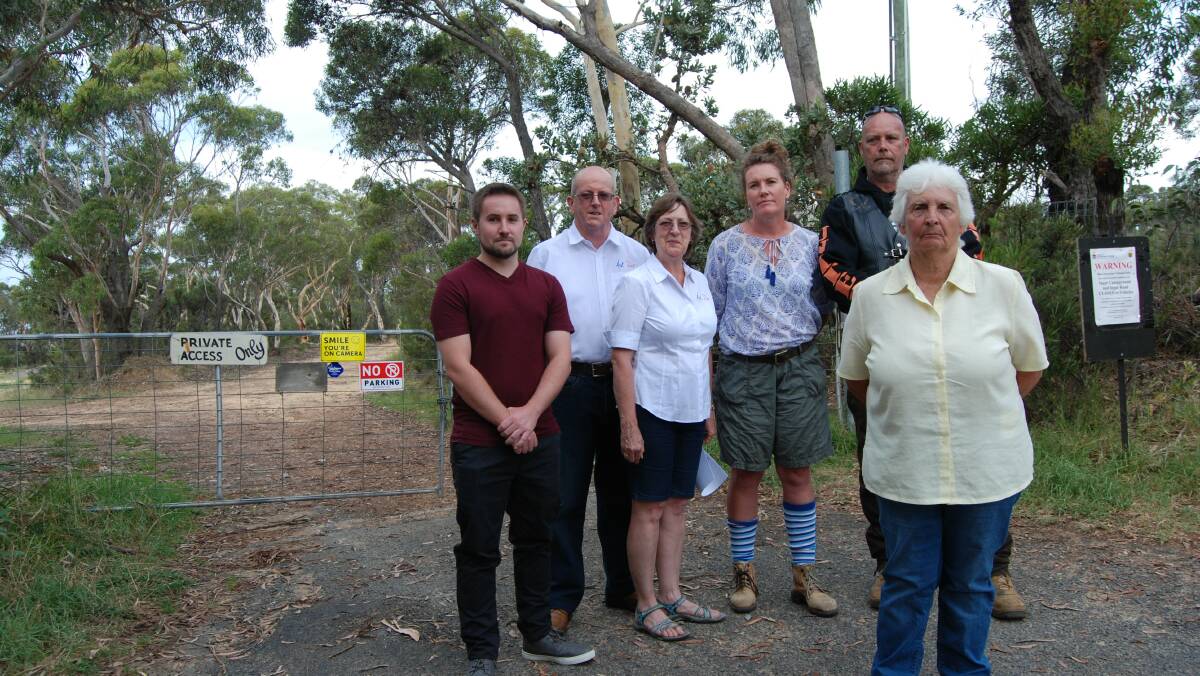 Angry over loss of Ingar access: Murray Clark, Graham and Ros Reibelt, MP Trish Doyle, Gary Rule and (front) Aunty Sharyn Halls.