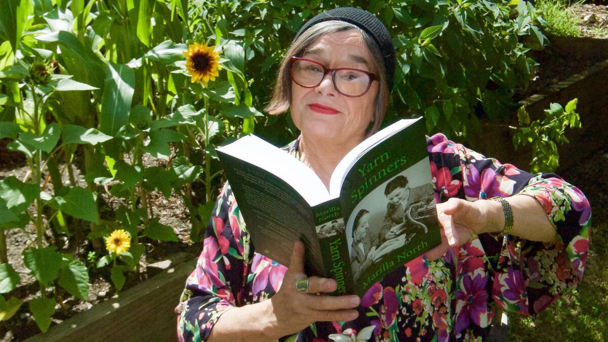 A great read: Leura's Marilla North holds up her new book on the tales of Dymphna Cusack, Miles Franklin and Florence James.  Photo by Lis Bastian.