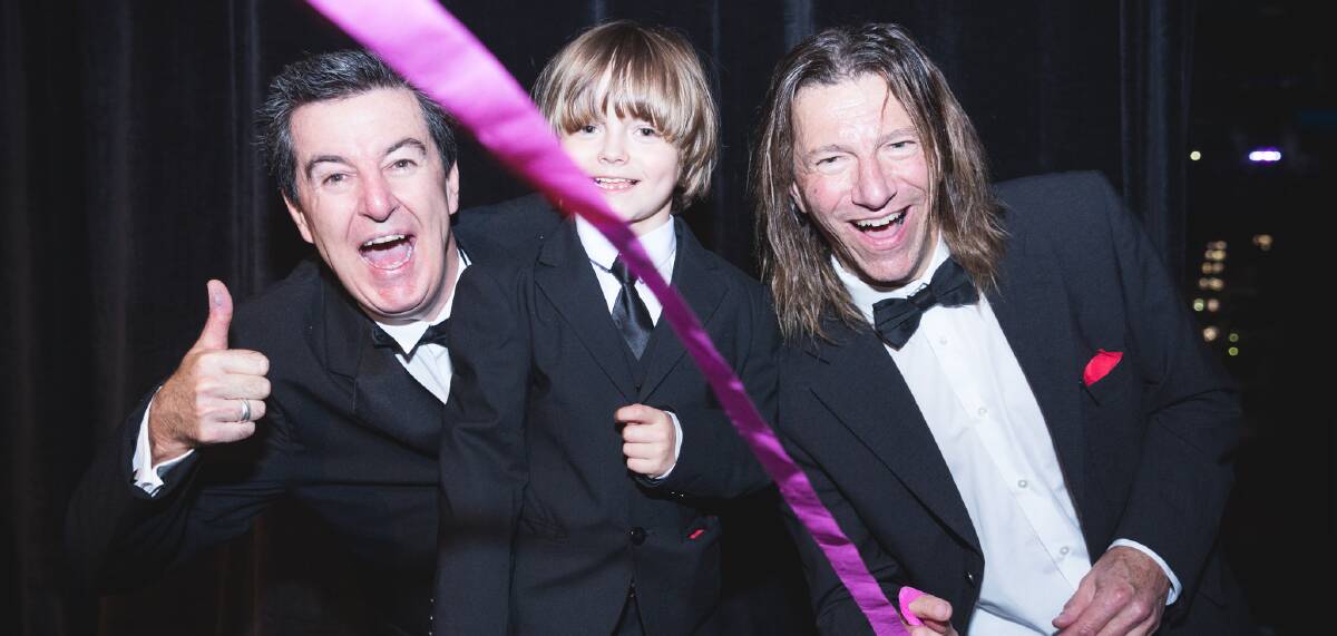 Winning moves: Fairmont owner Jerry Schwartz and his son Dane, 5, along with General Manager Scott O’Neile celebrate the Blue Mountains’ success.