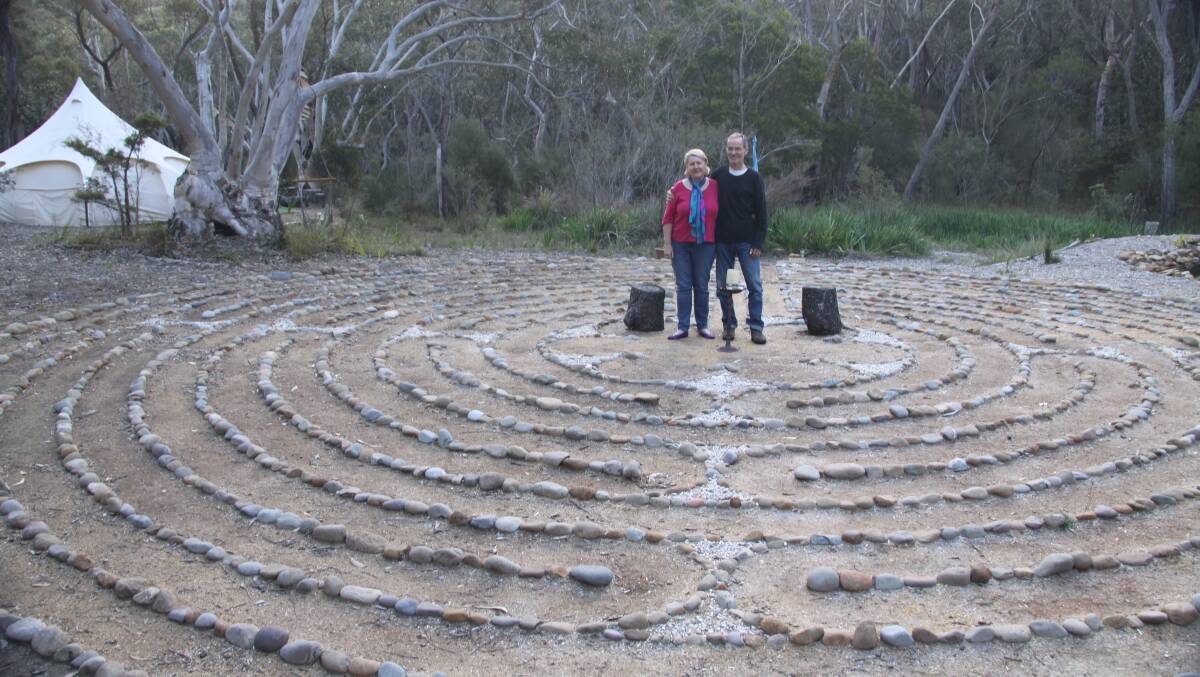 Donna Mulhearn and Martin Reusch in their labyrinth: Irish labyrinth teacher, Tony Christie, will give a workshop at their Woodford property on November 12-13.