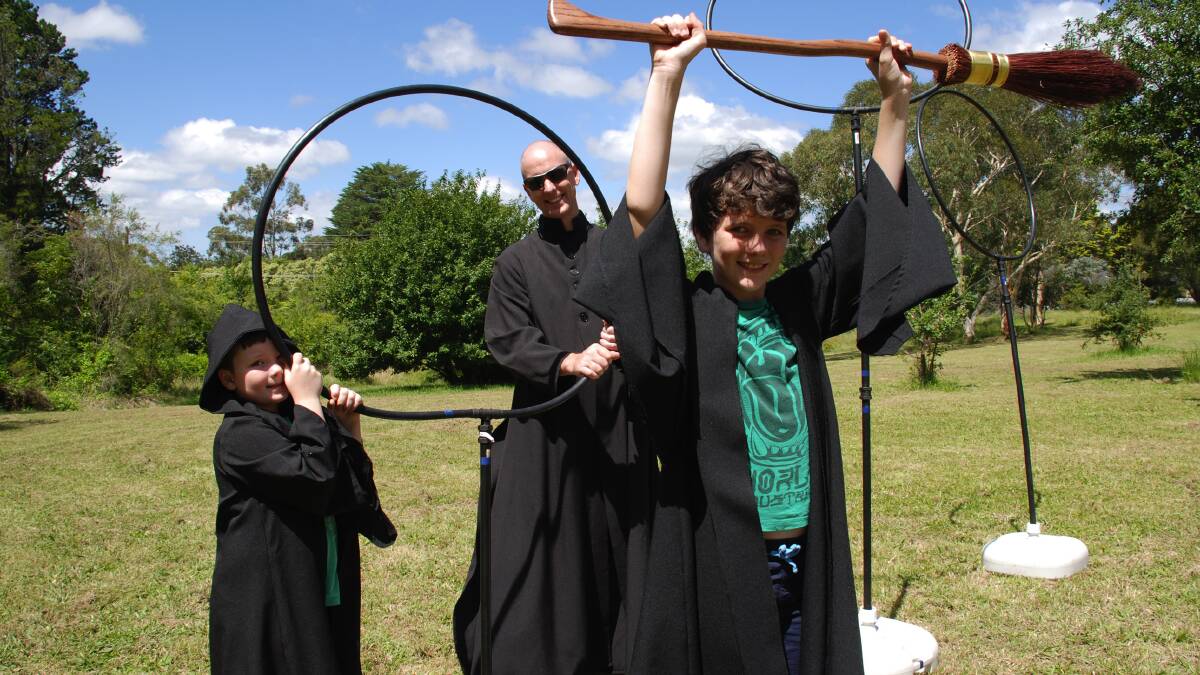 Anyone for Quidditch: Hunter and Ryder Sutton with Dad Michael (aka Sirius Black) from Newcastle at the Harry Potter day last year, organised by Megalong Books. Photo: B.C Lewis.