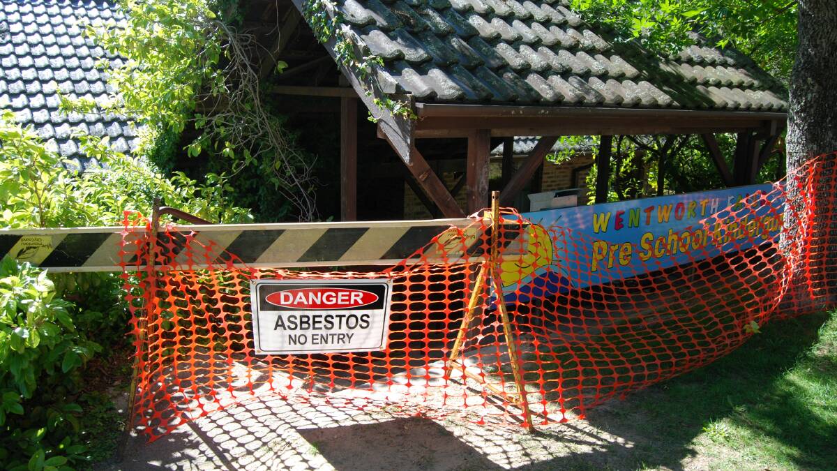 The sign says Danger Asbestos: The pre-school remained closed on Friday.
