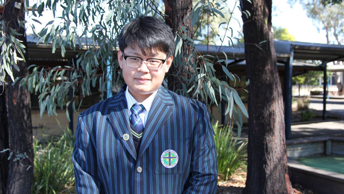 Thinking of others: Haochun Sun from China studies at St Paul’s Grammar School in Cranebrook and is one of three nominees for the The NSW International Student Award for 2016.