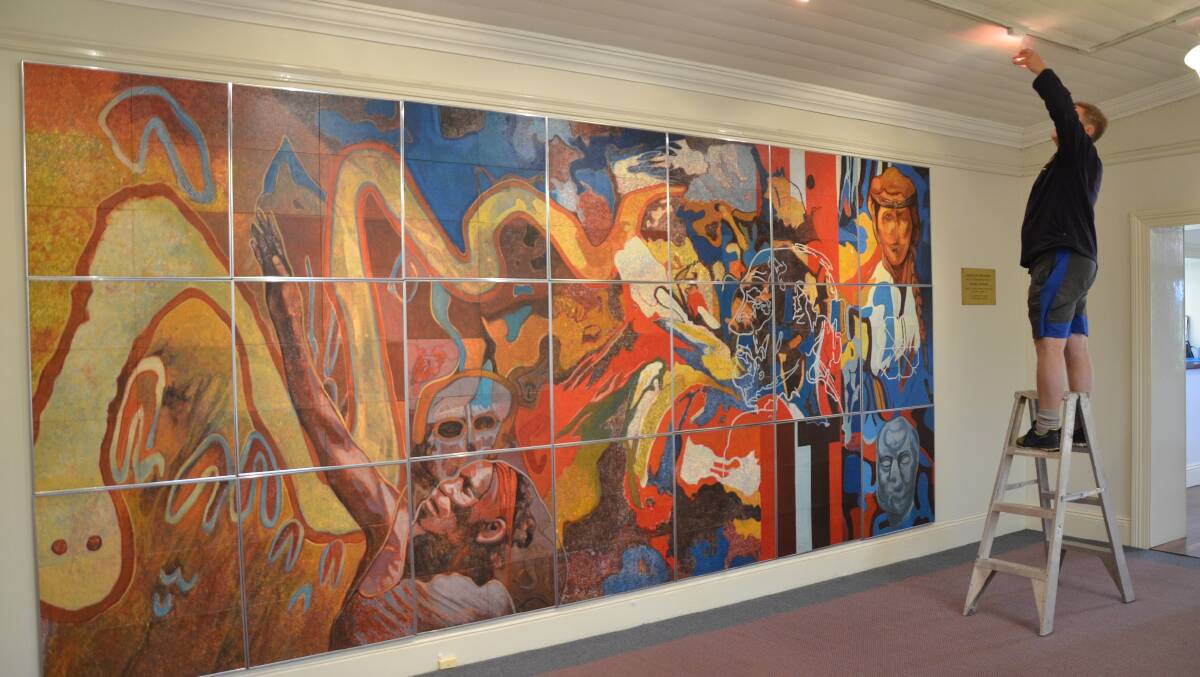 Rehung: The brightly coloured mural alludes to Aboriginal dot painting. The work is at the Blue Mountains Grammar School.