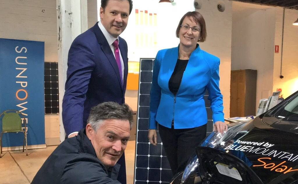 Full power: Blue Mountains Solar's Damian McMahon explains home solar, storage and electric cars to Labor's Ed Husic and Susan Templeman.