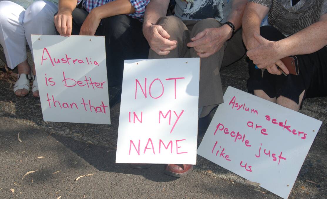 Standing form: Some 20 members of the congregation turned up to make a stand for asylum seekers last week.