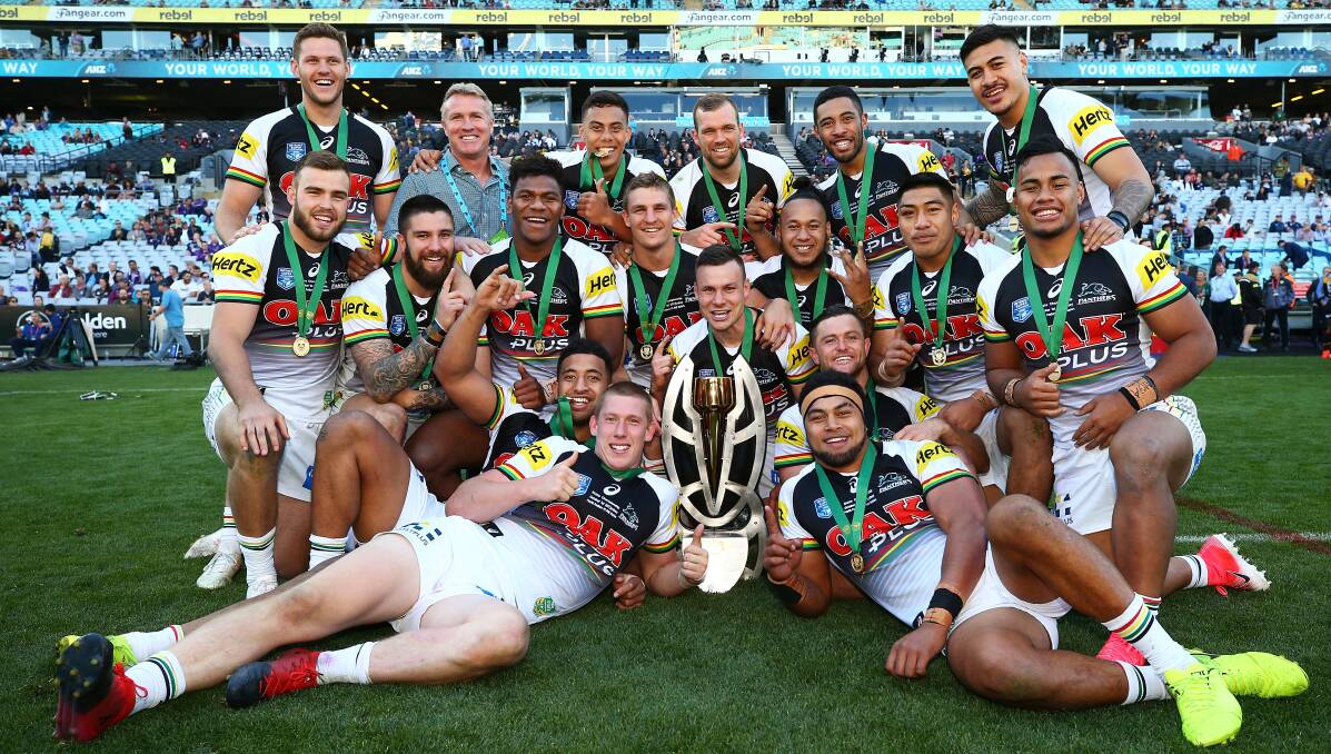 Centre stage: The Penrith Panthers celebrate winning the NRL State Championship grand final against the PNG Hunters. Centre Tony Satini scored four tries in the first half for the Panthers. Picture: NRL Photos