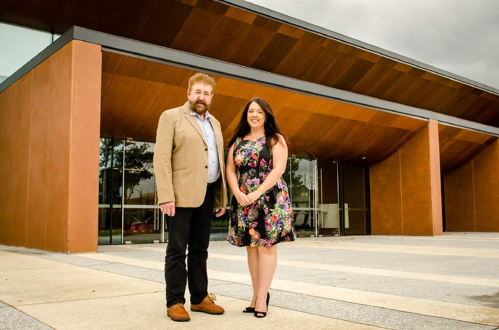 Returning to their roots: Blue Mountains Musical Society president Stephen Garnsey and secretary Kate Saunders outside the new Blue Mountains Theatre in Springwood.