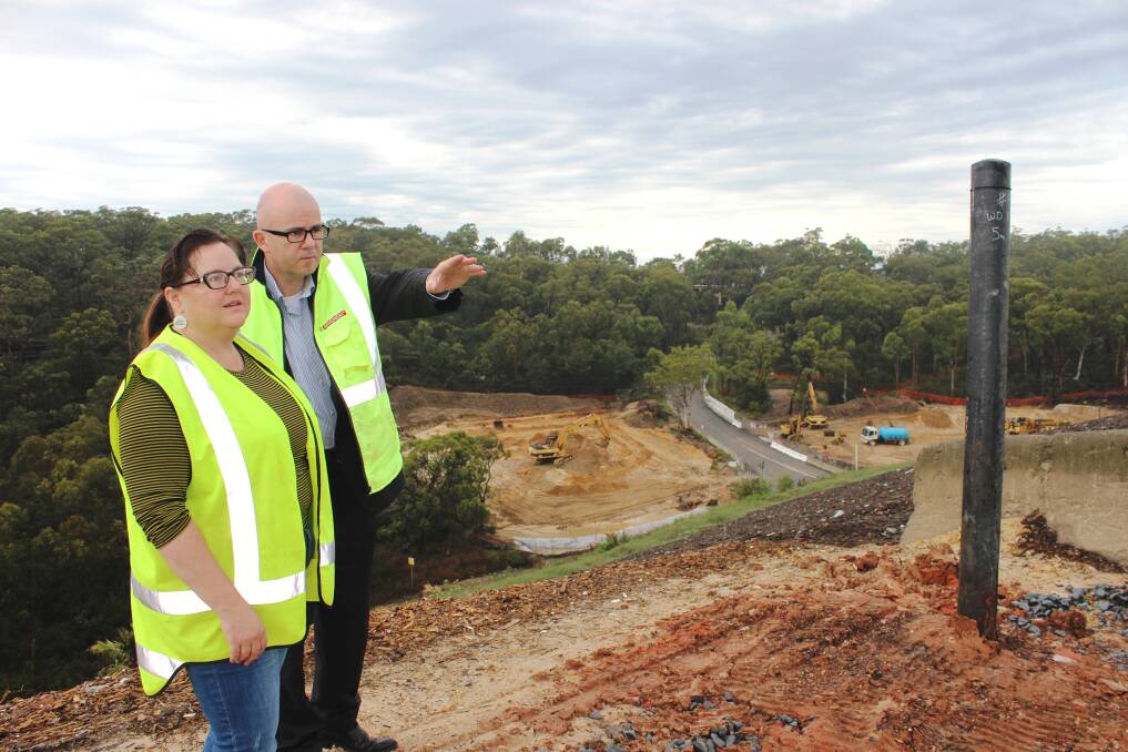 Blue Mountains mayor Mark Greenhill inspects progress on work at Blaxland Waste Management Facility, with council's waste and resources engineer, Sally Thompson.