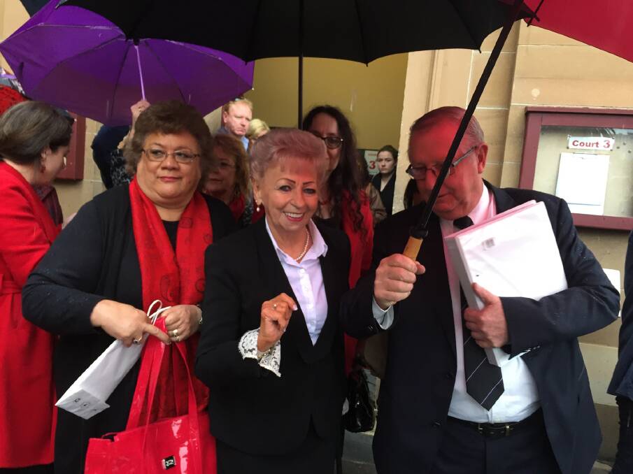 Roseanne Beckett (centre), outside the NSW Supreme Court in Sydney on Monday, August 24. Ms Beckett has been awarded $2.3 million plus costs after suing the state of NSW for malicious prosecution. She served most of a 12-year jail sentence for soliciting the murder of her ex-husband, but the conviction was quashed in 2005. She is pictured with supporters Mary Court and Jim McDonogh.