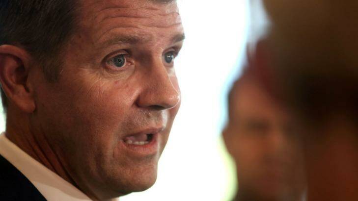 NSW Premier Mike Baird hopes to transfer the land titles registry to the private sector this year. Photo: James Alcock