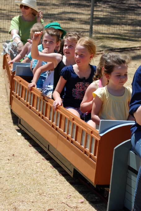 Children chug away on the mini train ride at last year's Glenbrook Spring Festival.