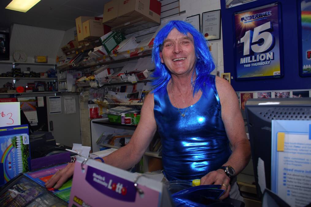 This Friday Noel Pope will be manning his Lawson newsagency counter in red hot pants and an electric blue ladies wig to raise money for beyondblue. He will wear the same outfit during his 1000km cycle down the east coast which he starts on Saturday. He posed in half the outfit for the paper.