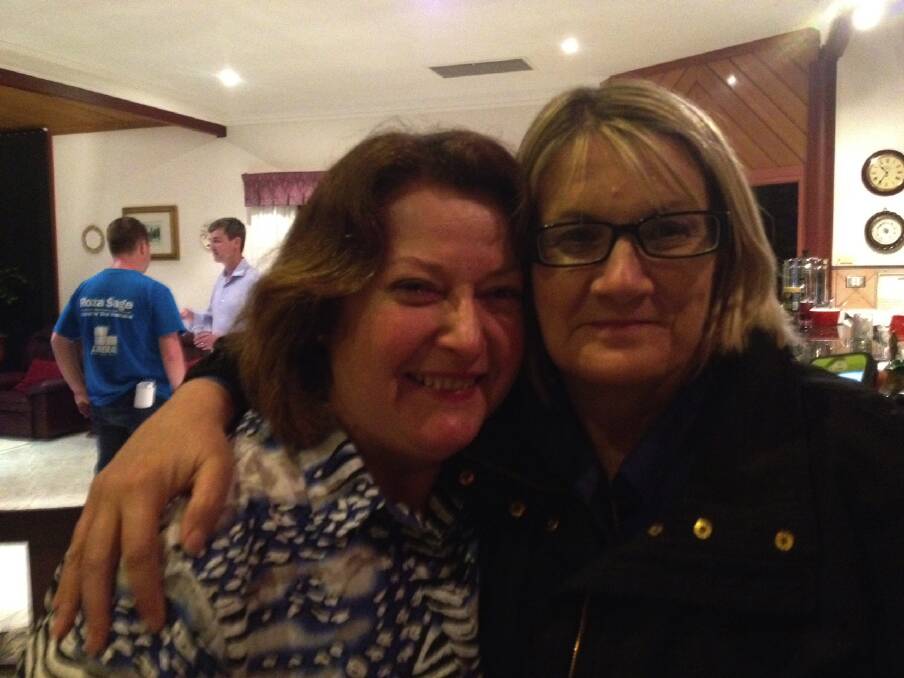 Roza Sage and Louise Markus at the Liberal Party election night gathering with State Electoral Conference president, Jeff Egan, in the background.