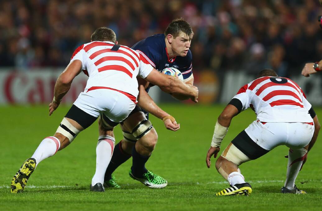 Up and at 'em: Bullaburra native and USA Eagles second-rower Hayden Smith takes on the Japanese defence during a Rugby World Cup Pool B match at Kingsholm Stadium, Gloucester on October 11. Photo: Steve Bardens/World Rugby via Getty Images.