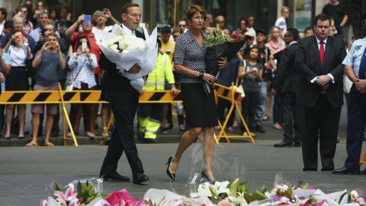 Tony Abbott and wife Margie pay their respects to victims of the Martin Place siege earlier this week. Photo: Steve Christo