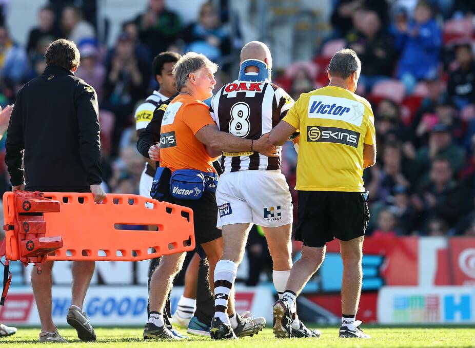 SYDNEY, AUSTRALIA - JULY 26:  Nigel Plum of the Panthers leaves the field with a neck brace during the round 20 NRL match between the Penrith Panthers and the Canberra Raiders at Pepper Stadium on July 26, 2015 in Sydney, Australia.  (Photo by Renee McKay/Getty Images)