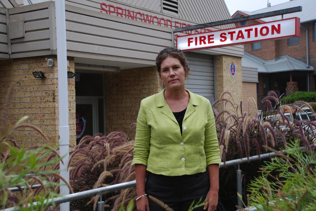 Labor's candidate for the Blue Mountains, Trish Doyle, outside the Springwood Fire Station on Monday said the loss of the on-call helicopter was a "blow" to the Blue Mountains.