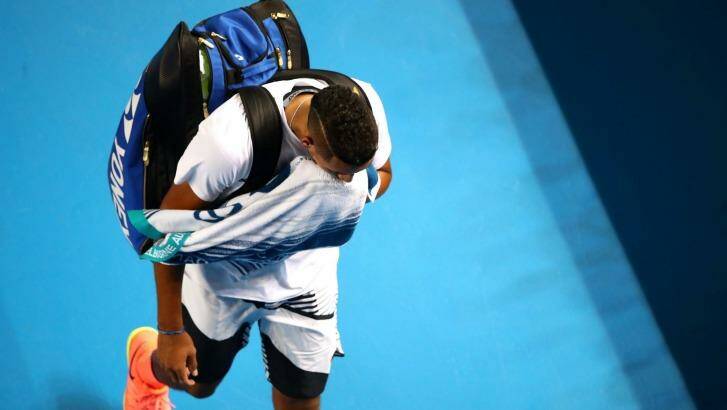 Kyrgios leaves the court on Wednesday night. Photo: Clive Brunskill/Getty Images