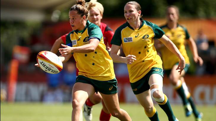 Cobie-Jane Morgan of Australia passes the ball out during the IRB Women's Rugby World Cup Pool C match between Australia and Wales on August 5. Photo: Jordan Mansfield