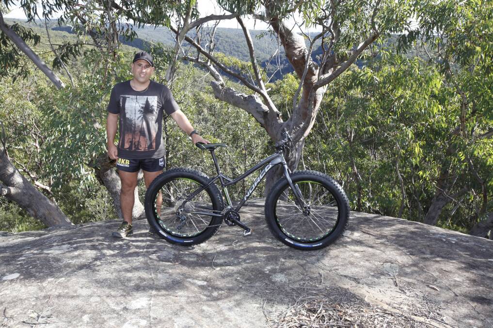 Constable James Ghata is taking part in the 300km Police Legacy Ride from Sydney to Canberra on a "fat bike", to raise money for the family of fallen police officers. It is a cause close to his heart, after witnessing the murder of his duty officer in 2012.