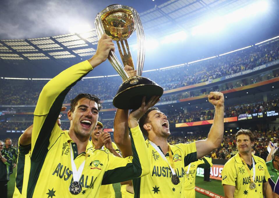 Pat Cummins and Mitch Marsh of Australia celebrate during the 2015 ICC Cricket World Cup final match between Australia and New Zealand at Melbourne Cricket Ground on March 29. Photo: Ryan Pierse/Getty Images